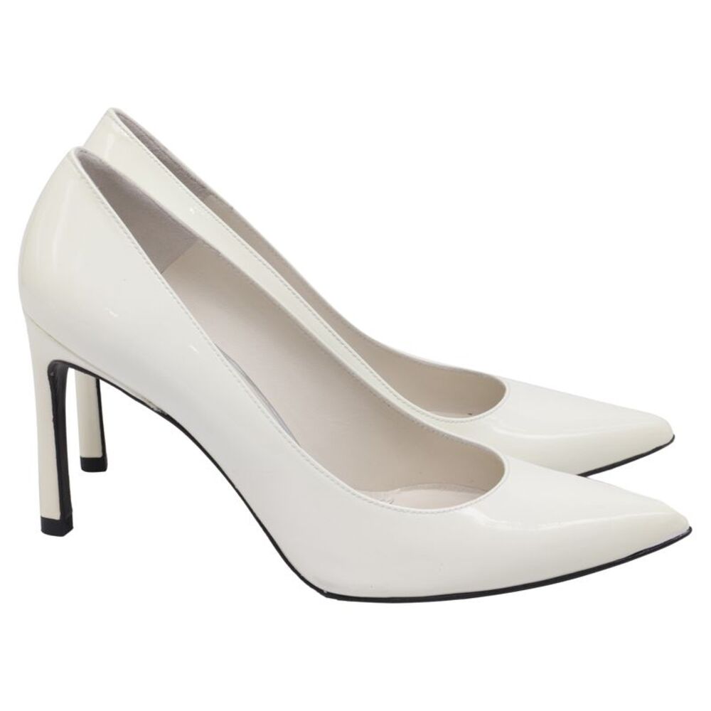 Stuart Weitzman Heist Pumps in White Patent Leather